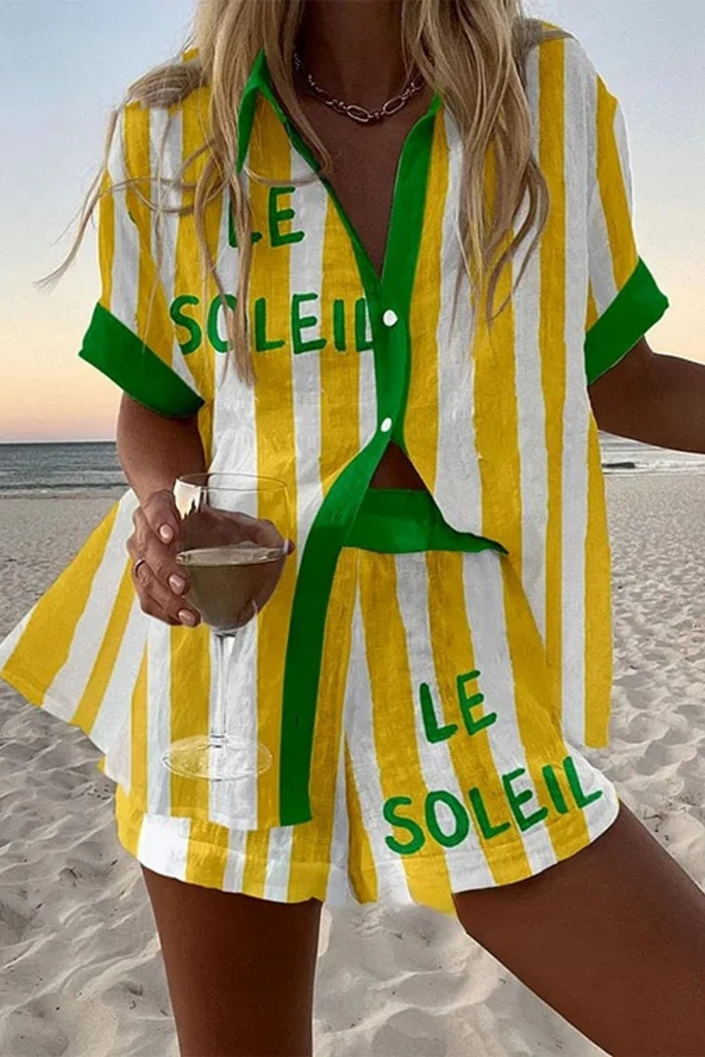 Halora | Women's Short suit with yellow stripes.