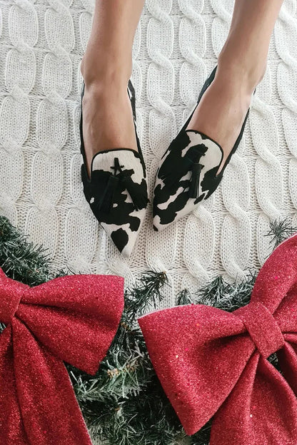 Pointed-Toe Cowprint Loafers With Tassel