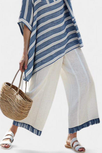 Ornella | Women's Longline Sophisticated blue striped top and trousers with hem details